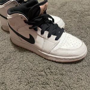 Nike Air Jordan W6.5 and Black High-Top Sneakers